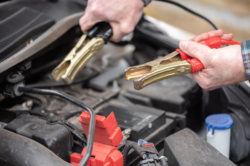 Guidelines for safely charging batteries and jump-starting vehicles. Battery charging hazards, procedures, PPE, storage, and handling.