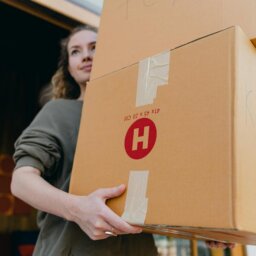 woman moving boxes