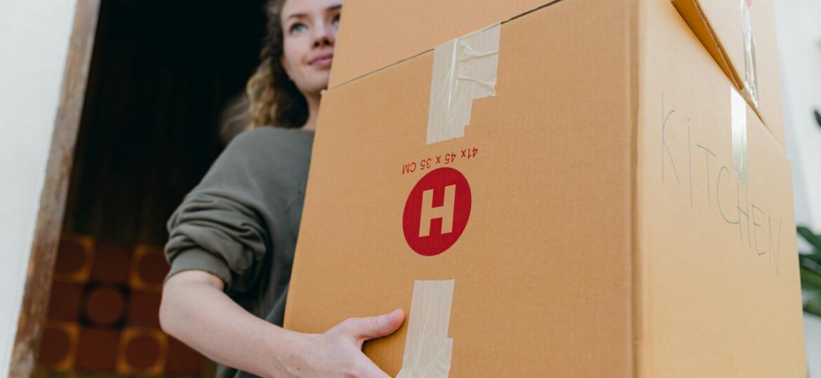 woman moving boxes